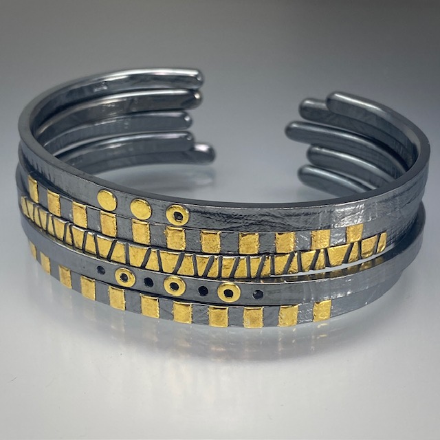 Thin bracelets stacked