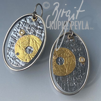 oval framed earrings with perforation