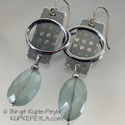 Sterling Silver Earring with Oval facetted Aquamarine Dangle