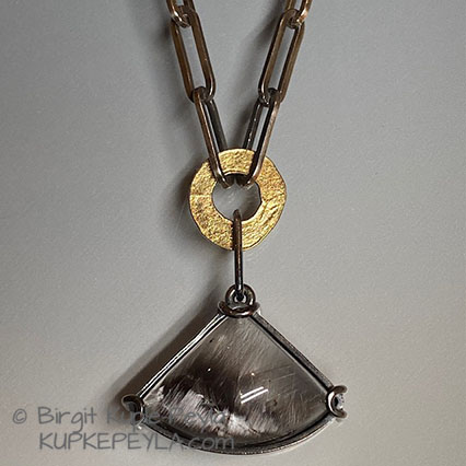 Quartz with InclusionsOne-of-a-kind necklace. 