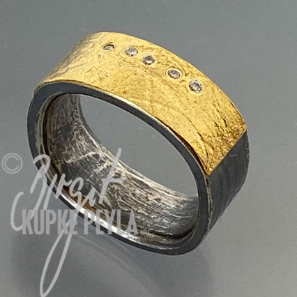Ring with Diamonds in an offset row
