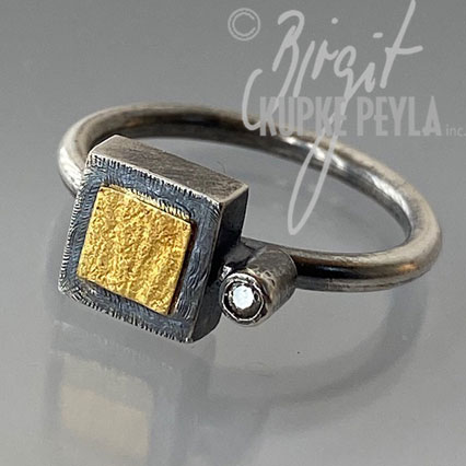 ring with small square and diamond